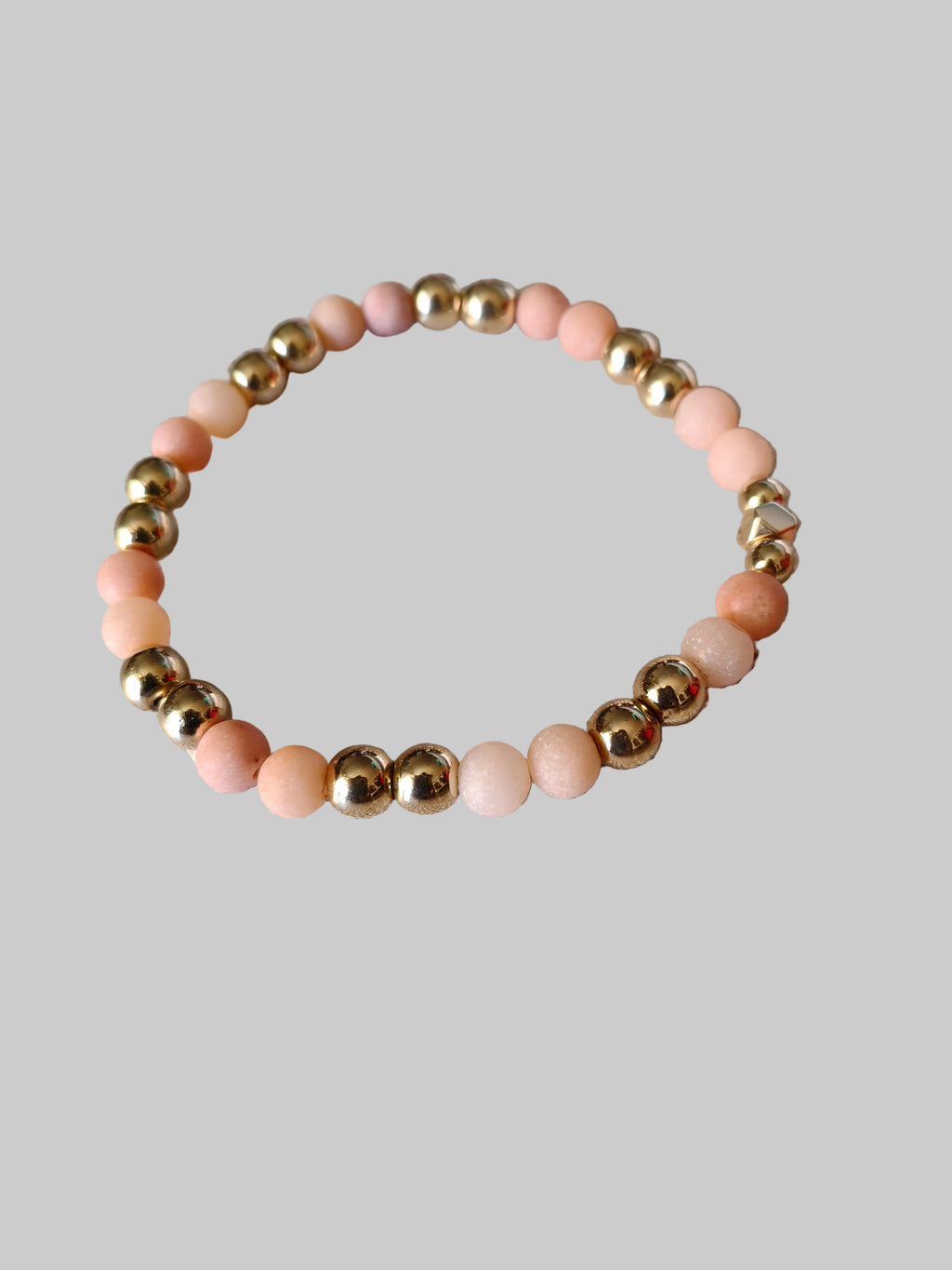 Bracelet en pierre de Jade orange et hématite dorée