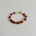 Bracelet en cornaline, pierre du soleil et hématite
