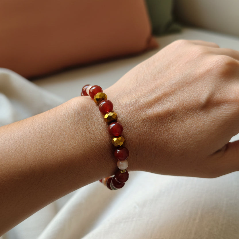 Bracelet cornaline, pierre du soleil, hématite et rondelles facettées