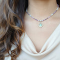 Collier améthyste et perles nacrées heishi avec pendentif soleil en acier inoxydable