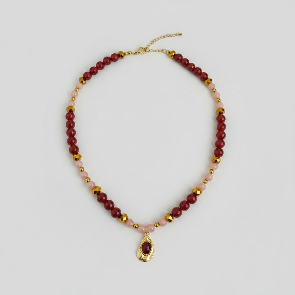 Collier en cornaline, pierre du soleil, hématite et rondelles facettées