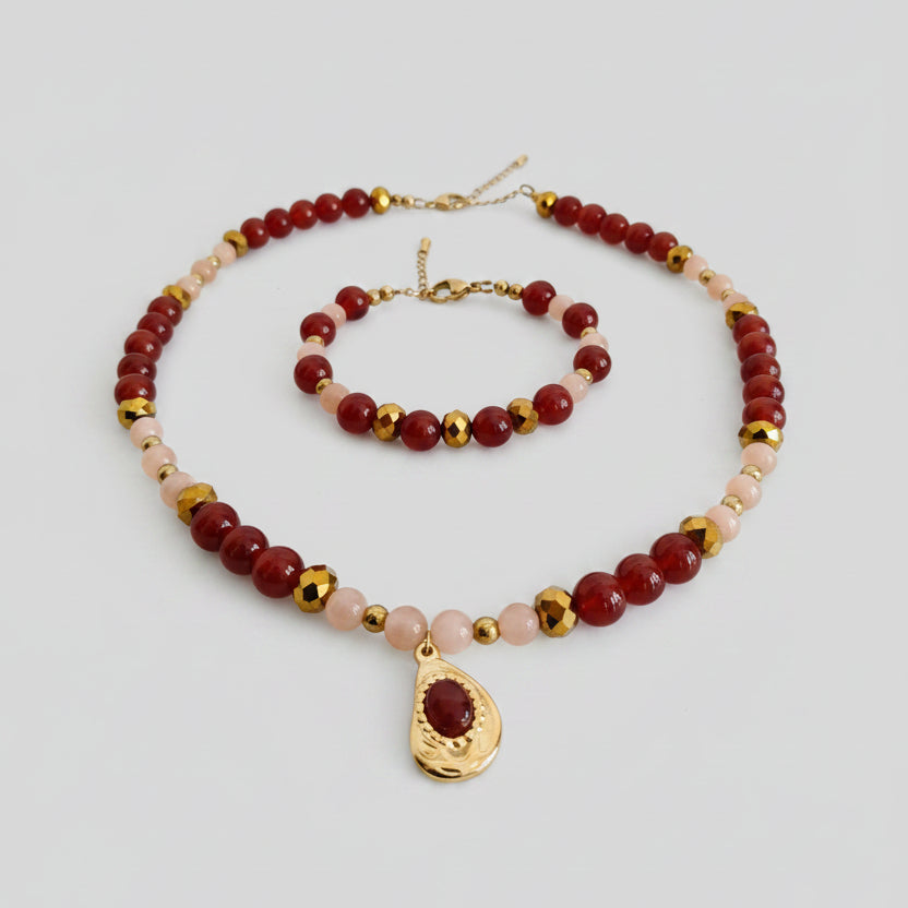 Duo bracelet et collier en cornaline, pierre du soleil, hématite et rondelles facettées