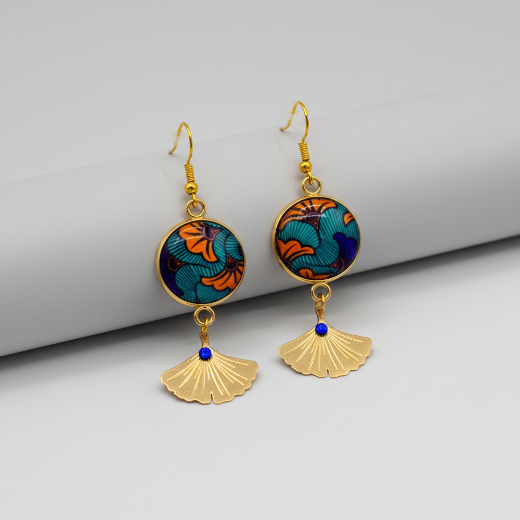 boucles d'oreilles bleu orange résine acier doré posées